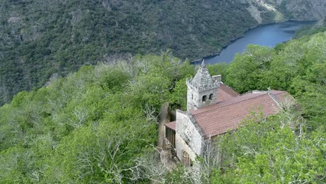aerial-view-of-monastery-of-Santa-Cristina-de-Ribas-de-Sil-in-Galicia-3840-x-2160-60fps