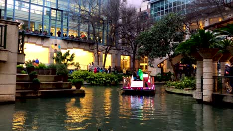 The-Parade-of-Lanterns-casts-a-beautiful-glow-from-the-boats-on-the-San-Antonio-Riverwalk