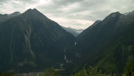 Establishing-shot-of-the-Zillertal-mountain-region-with-the-Krimml-waterfalls-seen-on-the-other-side-of-the-Valley