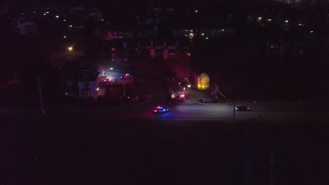 night-aerial-shot-of-ambulance-and-police-cars