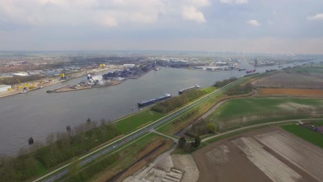Cargo-ships-at-the-port-of-Terneuzen,-Netherlands,-going-to-Ghent-in-Belgium