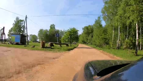 Drive-the-car-on-a-gravel-road,-time-lapse
