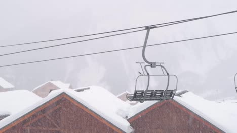 Lonely-chairlift-in-the-middle-of-a-snowstorm-in-a-ski-resort-in-the-mountains