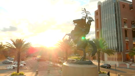 Aerial-View-of-Unconquered-Statue-at-FSU-Campbell-Stadium-During-Sunset
