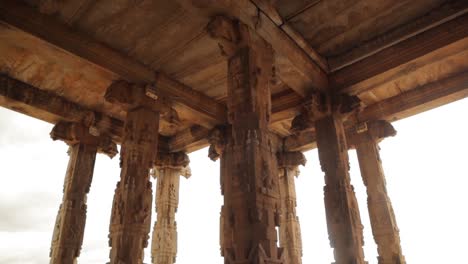 Pan-view-of-ruined-Ruined-Temple-Rock-Piller-architecture-inside-the-sanctum-santorum-of-Ganesha-Hampi