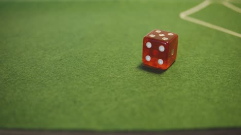 Two-Dice-rolling-on-green-casino-table---Slow-Motion