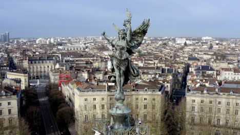 Detail-of-Angel-of-liberty-Girondins-monument-Bordeaux,-France,-Aerial-circling-shot