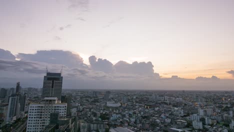 Time-lapse-of-cloud-movement-over-Bangkok-cityscape-during-golden-hour