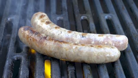Preparing-fresh-german-sausages-on-the-BBQ-grill,-Barbeque-in-Germany