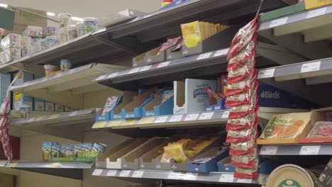 Restricted-supermarket-corona-virus-panic-buying-shoppers-store-shelves-scare