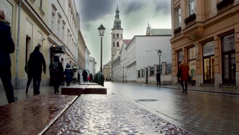 Krakow-timelapse-of-sightseeing-tourists-walking-ancient-architectural-street