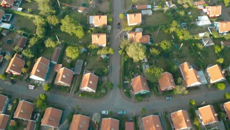 Aerial-top-down-reveal-of-single-family-houses-"svenskehus"-on-Bornholm-during-summer