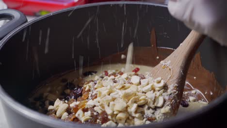 Close-up-footage-of-preparation-of-healthy-energy-bars,-made-with-couverture-chocolate-and-cereal