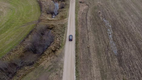 Card-drivin-on-the-country-side-road,-aerial-shot