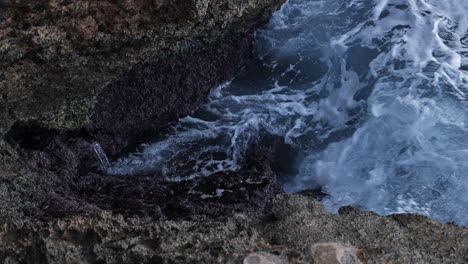 Waves-crashing-against-sea-cliff