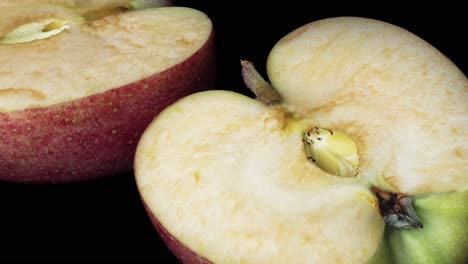 Smooth-macro-shot-showing-two-halves-of-decaying-apple,time-lapse-shot