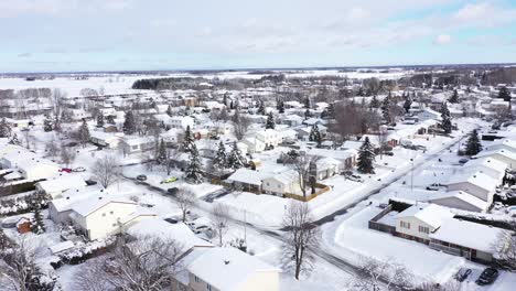 cute-village-covered-by-fresh-snow-in-deep-winter-aerial