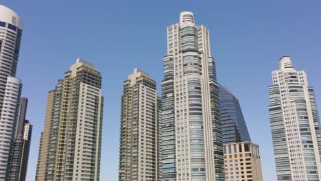 Aerial-low-angle-shot-of-the-top-of-Buenos-Aires-skyscrapers-against-the-blue-sky