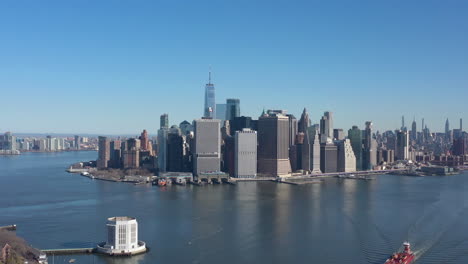 An-aerial-view-of-New-York-harbor-on-a-sunny-day-with-clear-blue-skies