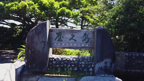 Yakushima-Island-Sign,-Pan-Establishing-Shot-of-Small-Japanese-Island