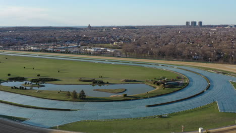 An-aerial-view-over-a-horse-race-track-on-a-sunny-day,-while-it-was-closed-for-renovations