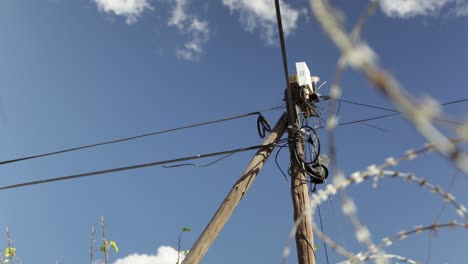 Timelapse-Telecommunications-Pole-With-Barbed-Wire
