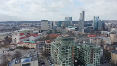 AERIAL:-Flying-Over-Vilnius-Business-District-with-Visible-Skyscrapers-in-the-Shot
