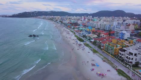 Aerial-establishing-shot-of-Bombas-y-Bombinhas-with-a-colorful-sunset-in-Brazil