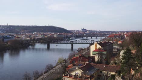Beautiful-view-of-whole-Prague-city-from-Upper-Castle,-Vltava-river-and-bridges-in-spring-colors,-static-long-shot