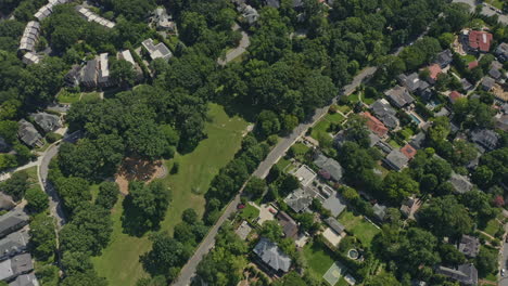 Atlanta-Georgia-Aerial-v614-tilt-up-shot-of-Ansley-Park,-revealing-skyscrapers-in-midtown---July-2020