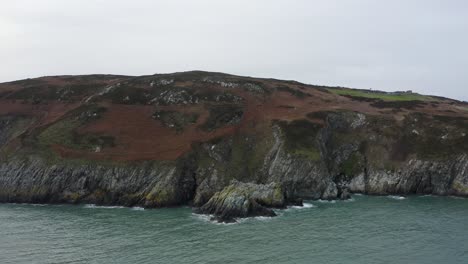 Aerial-view-of-the-beautiful-cliffs-of-Howth-during-a-cloudy-day