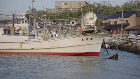 Fishing-boats-in-harbor-at-small-town-of-Mikuriya,-Tottori-Japan
