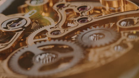 Ancient-Golden-Cogwheel---Golden-Old-Clock-Mechanism---macro-shot