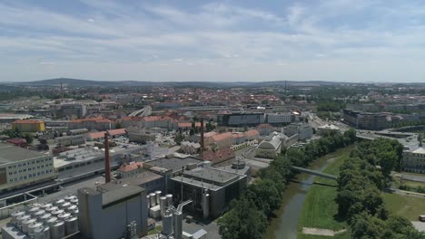 Scenic-aerial-view-of-industrial-zone-in-Pilsen-in-Czech-Republic,-drone-flying-forward,-day