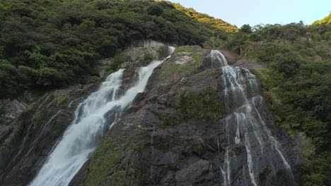 Ohko-Waterfall-in-Yakushima-Japan,-Aerial-Pan-shot