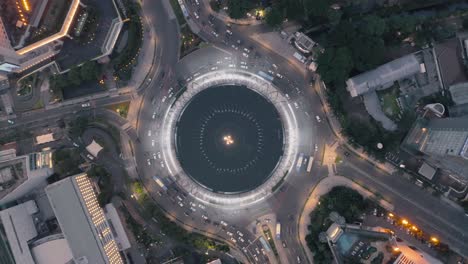 Tracking-cars-in-a-city-traffic-circle---3d-render-animation-loop---birdseye-drone-shot