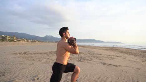 athlete-training-on-the-beach-with-weight-on-the-upper-body-on-the-beach