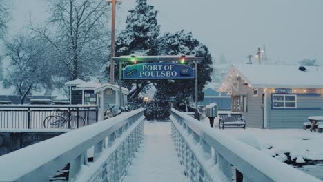 An-early-winter-morning-on-the-Poulsbo-Harbor-during-a-rare-Seattle-snow-storm,-looking-towards-town