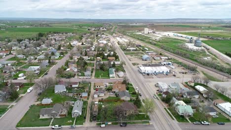 The-historic-town-of-Wheatland-Wyoming-in-2021-springtime-green-grass-after-snow-melt-and-rains