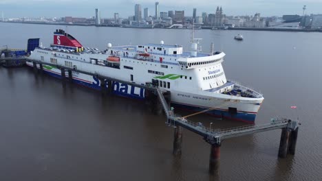 Stena-Line-freight-ship-vessel-loading-cargo-shipment-from-Wirral-terminal-Liverpool-aerial-view-drift-left
