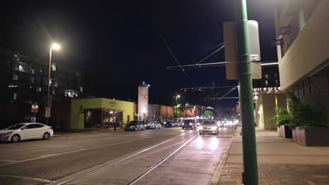 Tram-and-cars-at-night-in-American-city