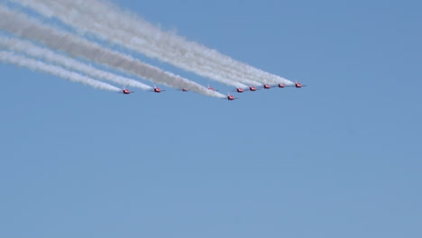 British-air-force-aerobatic-team-flying-over-leaving-white-smoke-trail