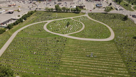 Aerial-flyover-rural-Cemetery-beside-parking-area-in-Welland,Canada