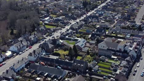 Aerial-view-of-the-Scottish-town-of-Edzell-on-a-sunny-spring-day,-Angus,-Scotland