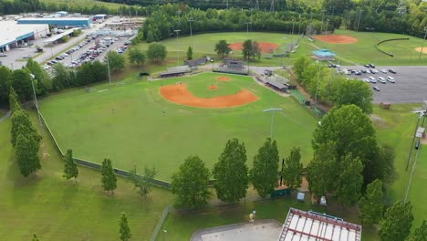 Drone-shot-of-a-baseball-field-with-players-on-it