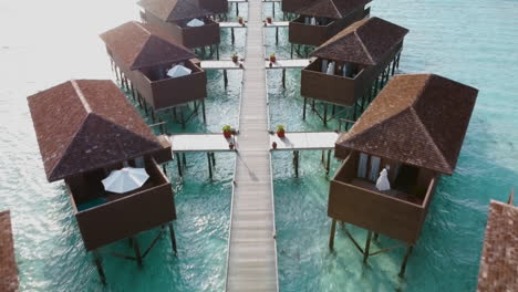 Aerial-View-Of-Bungalows-At-Meeru-Island-Resort-During-Summer-In-Maldives