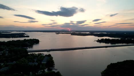 Beautiful-Aerial-Sunset-at-Lake-Norman-NC,-Lake-Norman-North-Carolina-with-i77-Causeway-Below