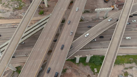 Aerial-of-cars-on-610-and-59-South-freeway-in-Houston,-Texas