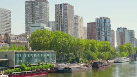Camera-panning-along-the-Seine-River-providing-a-vivid-view-of-the-Paris-cityscape