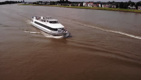 Aerial-View-Of-Z8-Passenger-Ship-Travelling-Along-River-Noord-In-The-Netherlands